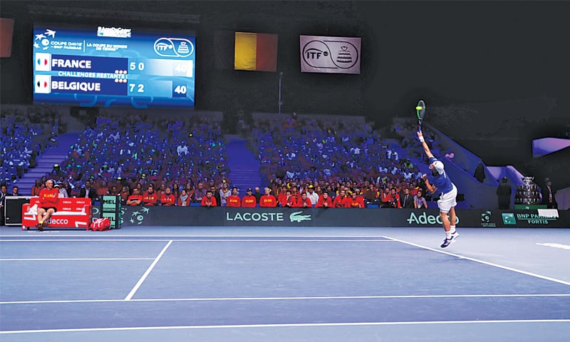LILLE (France): Lucas Pouille of France serves during his match against Belgium&rsquo;s David Goffin in the Davis Cup final on Friday.&mdash;Reuters