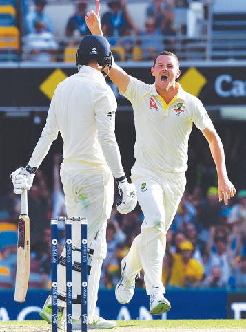 BRISBANE: Australian paceman Josh Hazlewood celebrates the wicket of England&rsquo;s James Vince.&mdash;AFP