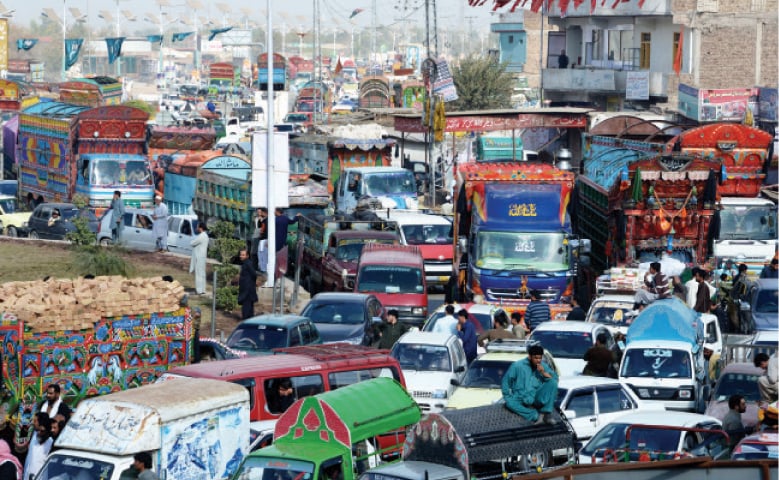 Motorists stuck in a traffic jam near Jameel Chowk.&mdash;White Star