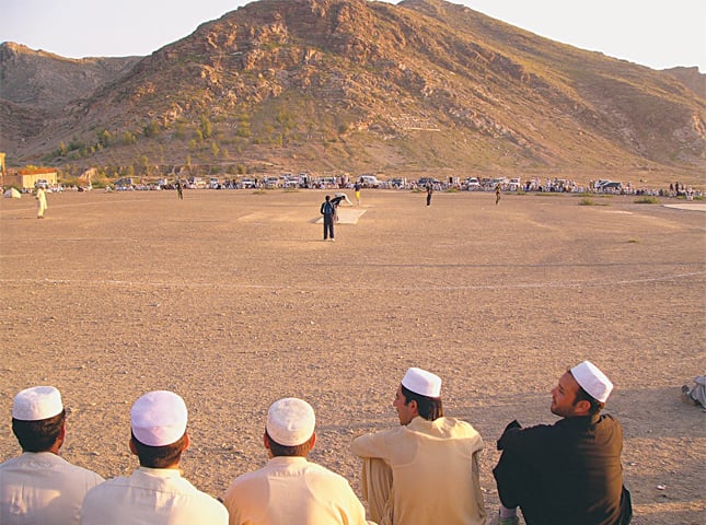 Lacking facilities: playing cricket on undeveloped grounds