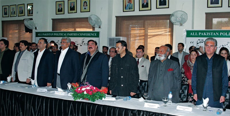 Leaders of political parties stand in the honour of the national anthem at the All-Party Conference hosted by the Lahore High Court Bar Association. &mdash; White Star