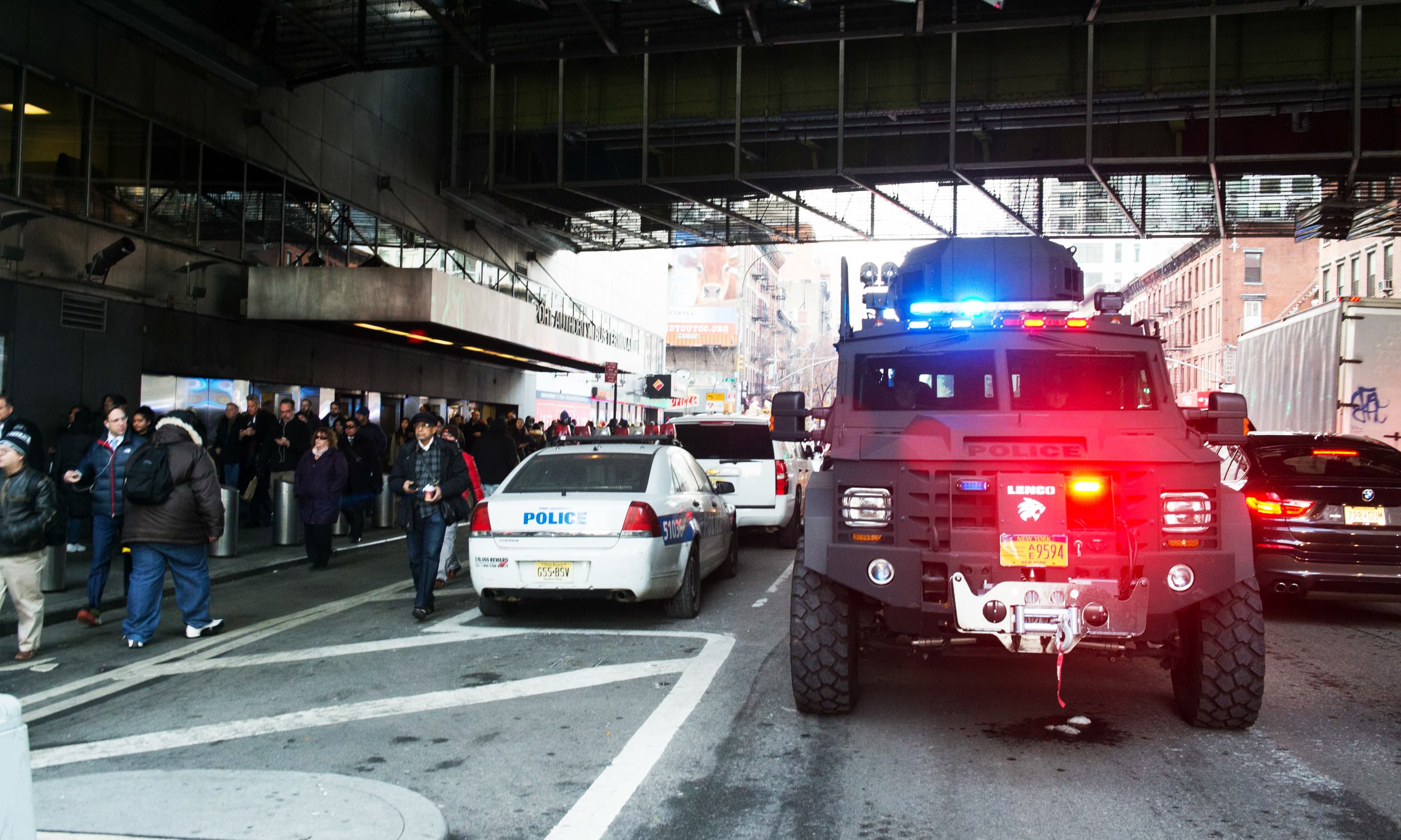 Police respond to a reported explosion at the Port Authority Bus Terminal in New York. &mdash;AFP