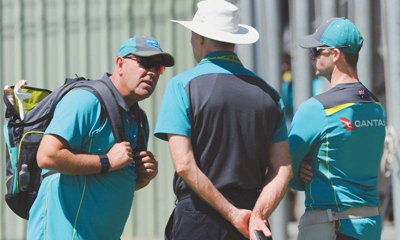 AUSTRALIAN captain Steve Smith (R) speaks with coach Darren Lehmann (L) and Greg Chappell during a training session on the eve of the third Ashes Test on Wednesday.&mdash;AFP
