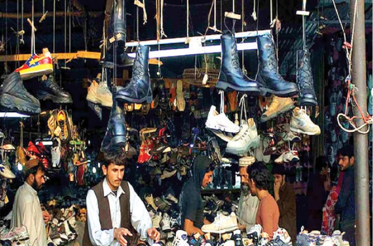 A shoe shop in Kohat’s flea market. —Dawn