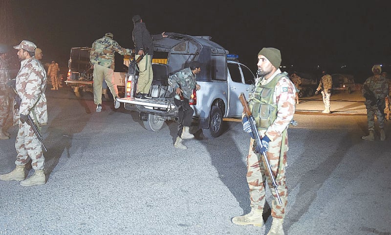 QUETTA: Members of security forces arrive at the site of the suicide attack near an FC check-post on the outskirts of the provincial capital on Tuesday.&mdash;INP