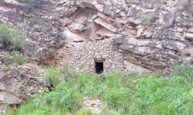 The entrance to a cave on the right corner of Nandna Fort. &mdash; Photos by the writer