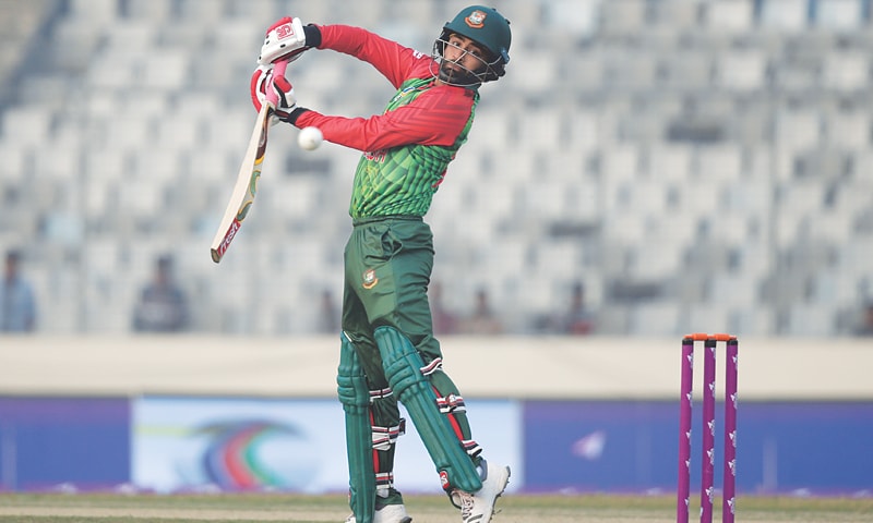 DHAKA: Bangladesh opener Tamim Iqbal plays a shot during the first match of the Tri-Nation ODI series against Zimbabwe on Monday.&mdash;AP