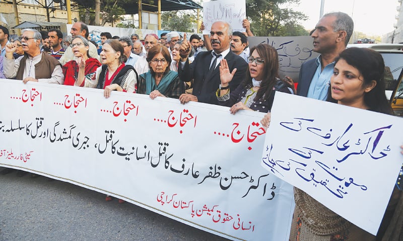 Rights activists and friends of Prof Hasan Zafar Arif hold a protest demonstration in front of the Karachi Press Club on Tuesday.—White Star