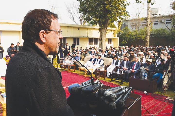 AFGHANISTAN’s Ambassador Hazrat Omar Zakhilwal addresses a jirga of refugee elders in Peshawar on Wednesday.—Abdul Majeed Goraya