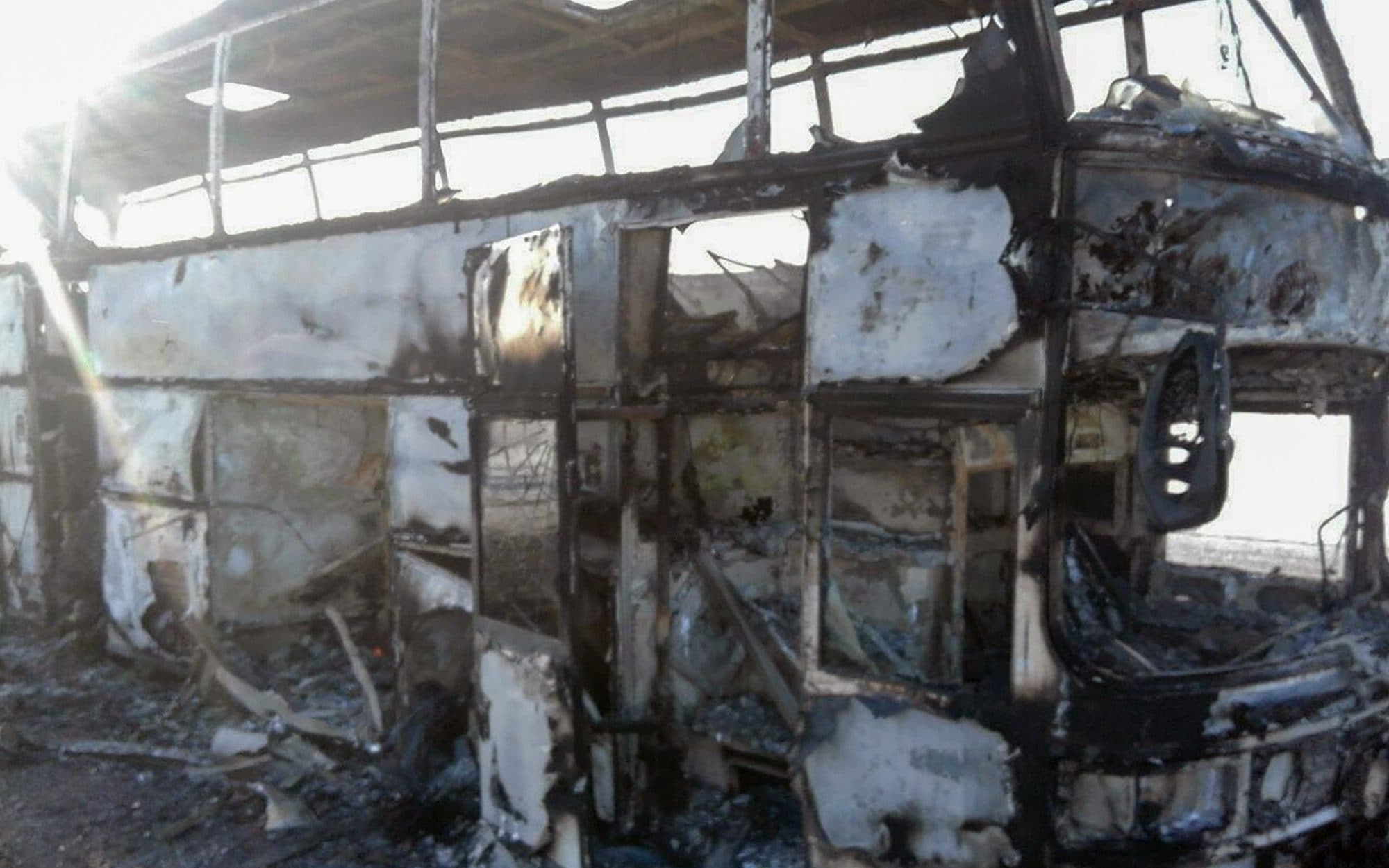 Russia-bound bus catches fire in Kazakhstan.—AFP Russia-bound bus catches fire in Kazakhstan.—AFP