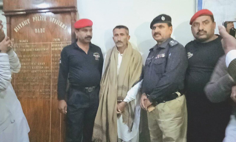 THE man identified as Sikandar Chandio in police custody at Dadu SSP’s office.—Dawn THE man identified as Sikandar Chandio in police custody at Dadu SSP’s office.—Dawn