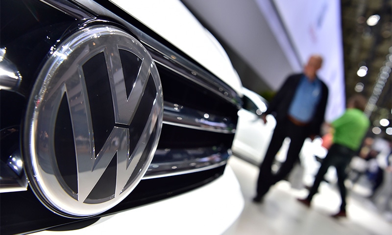 In this file photo taken on June 22, 2016 a Volkswagen logo is seen on a VW Tiguan on display during German carmaker Volkswagen shareholders' annual general meeting.─AFP