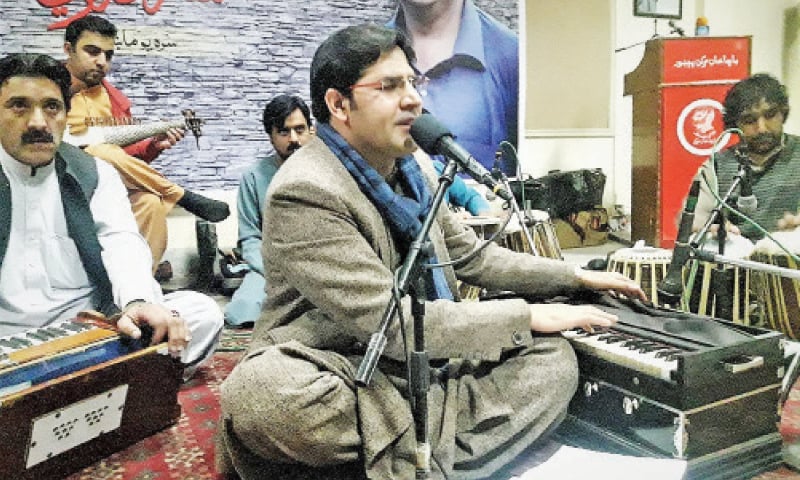 A singer performs at Bacha Khan Markaz, Peshawar. &mdash; Dawn