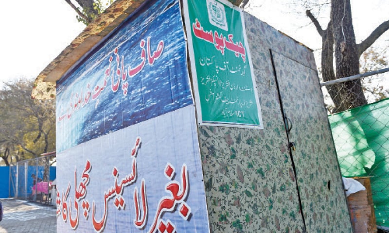 The ICT administration has put up posters prohibiting fishing without licence. — Photos by Tanveer Shahzad