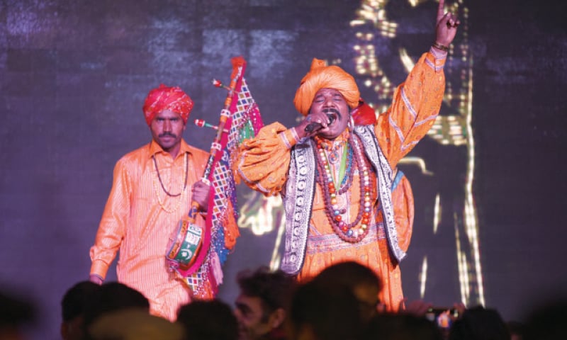 Folk singers Krishan Laal Bheel (top) and Muskaan (below) perform at Lok Virsa on Saturday night. &mdash; White Star