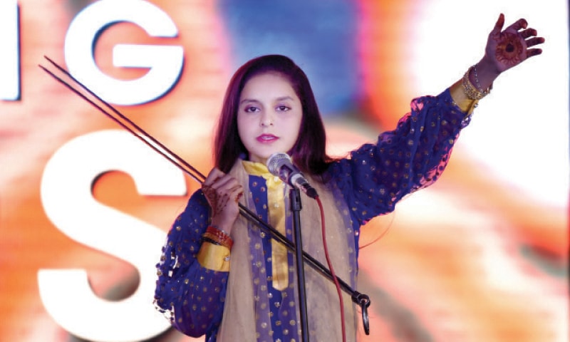 Folk singers Krishan Laal Bheel (top) and Muskaan (below) perform at Lok Virsa on Saturday night. &mdash; White Star