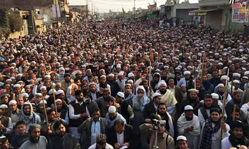 A view of the protest in Mardan on Friday.— DawnNews