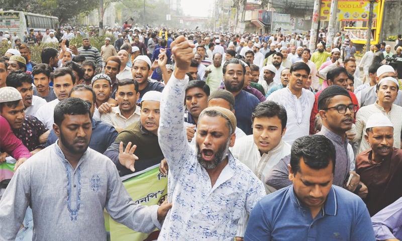 DHAKA: BNP activists shout slogans in protest against the conviction of party leader Khaleda Zia on Friday—AFP