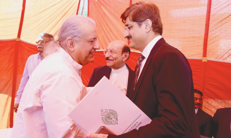SENATE Chairman Mian Raza Rabbani greets Chief Minister Syed Murad Ali Shah on the acceptance of PPP candidates&rsquo; nomination papers.&mdash;PPI
