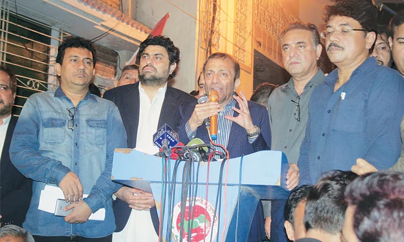 MQM-P convener Dr Farooq Sattar addressing media at his residence on Saturday night.—White Star