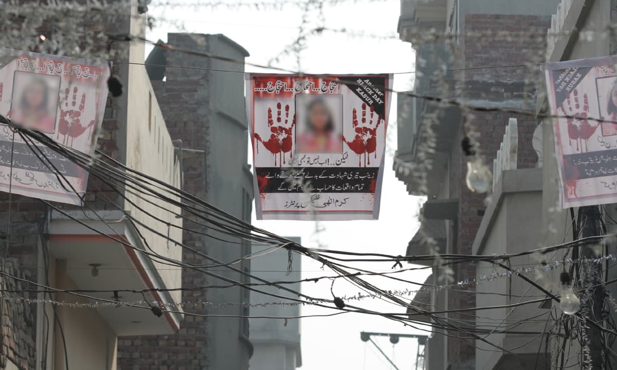 Posters protesting Zainab’s murder hang above a street in Kasur | Feryal Ali Gauhar