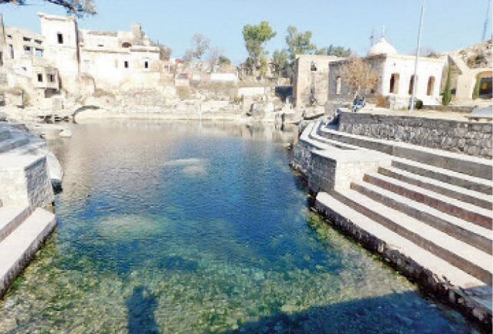 The Katas Raj pond, which had dried out a few months ago, has been refilled by a cement factory. — Dawn