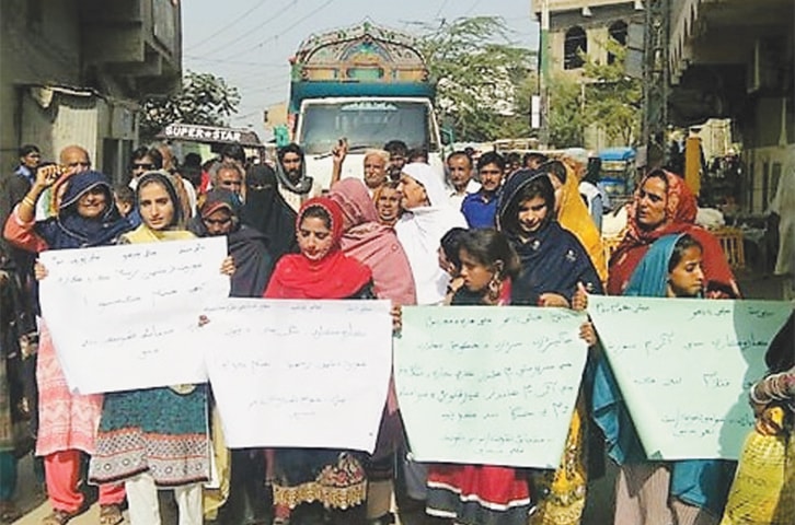 A RALLY organised by AT passes through a street in Badin.&mdash;Dawn