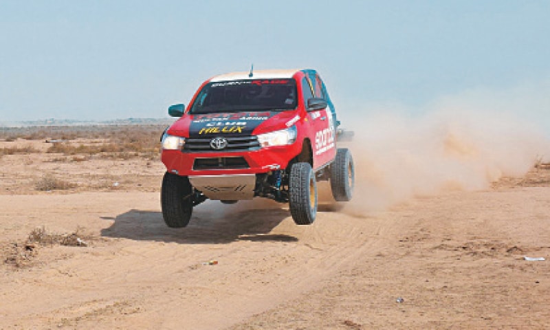 BAHAWALPUR: One of the participants in the action-packed Cholistan jeep rally heading for the finishing line. &mdash; Online