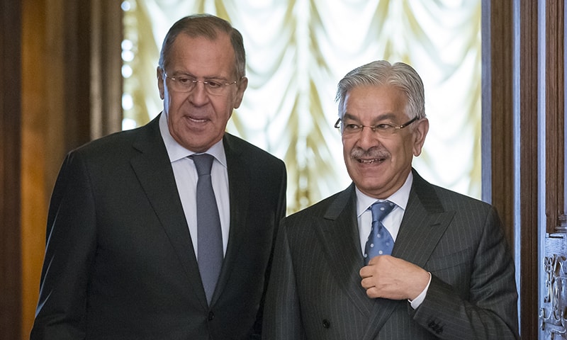 Russian Foreign Minister Lavrov, left, and Pakistan's Foreign Minister Khawaja Muhammad Asif enter a hall for their talks in Moscow, Russia on Tuesday.— AP