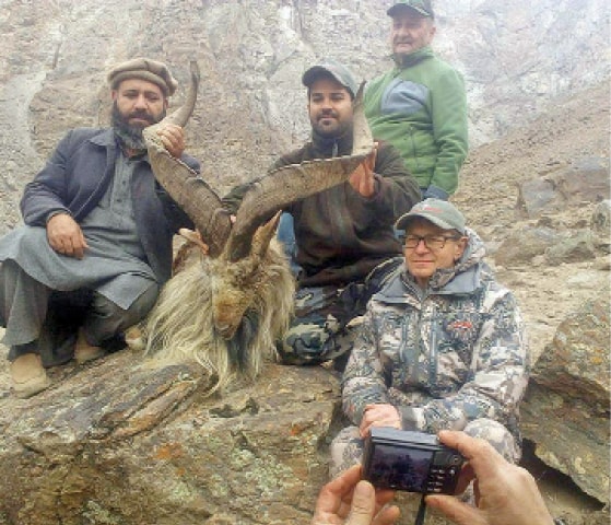 The Canadian hunter along with the markhor in Astore. — Dawn