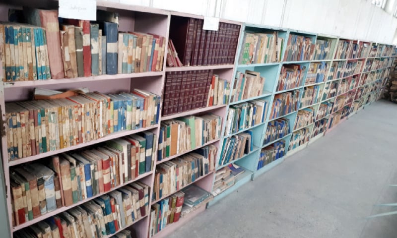 Worn out books at the library. — Photos by the writer Worn out books at the library. — Photos by the writer