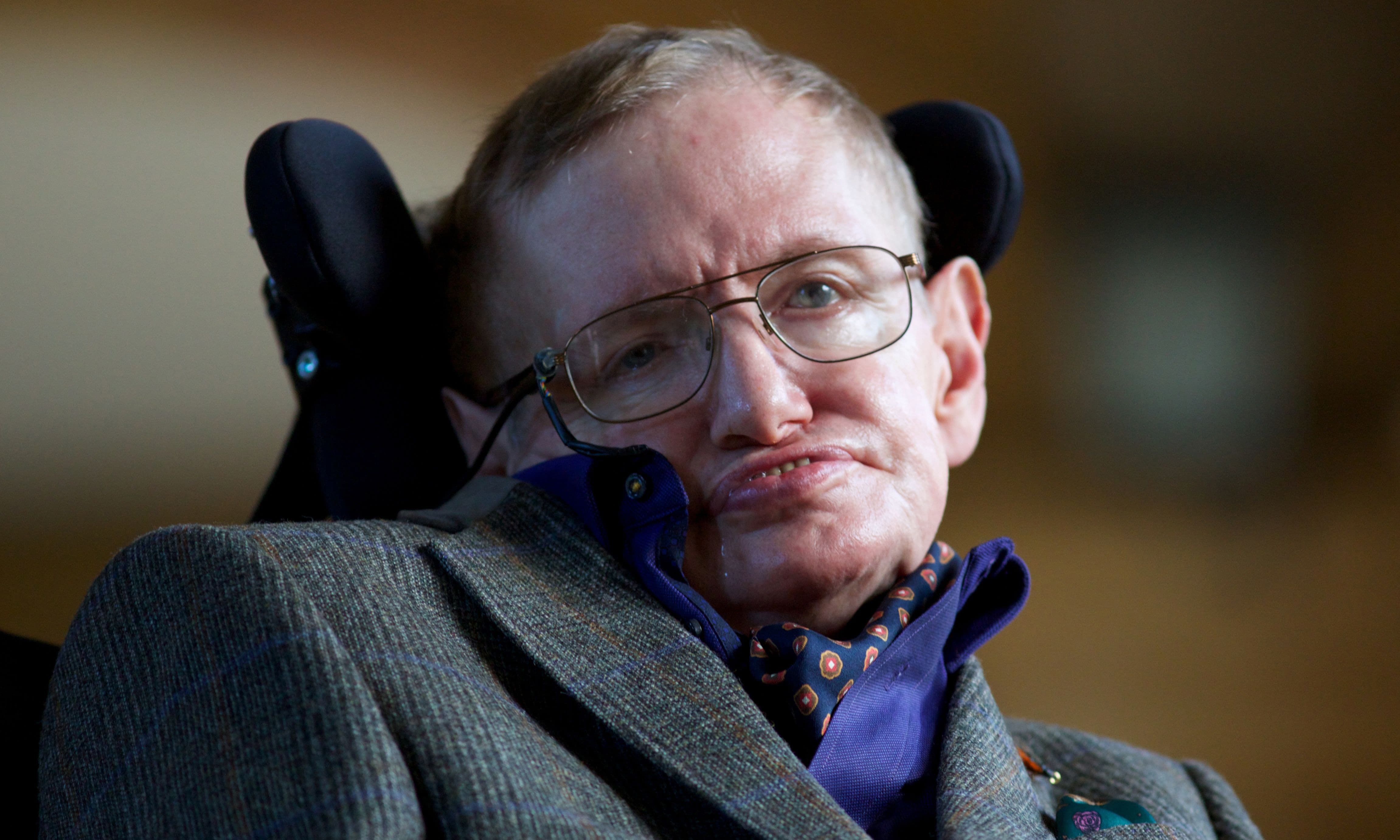 In this file photo taken on September 19, 2013, theoretical physicist Stephen Hawking poses for a picture ahead of a gala screening of the documentary 'Hawking', a film about the scientist's life, at the opening night of the Cambridge Film Festival in Cambridge, eastern England. — AFP