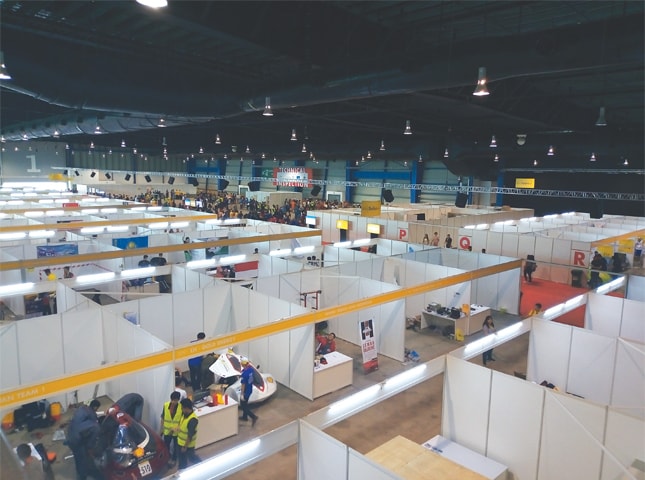 Busy young engineers in the student paddocks