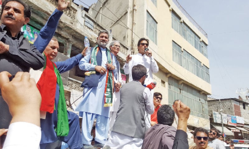 Imran Khan addresses PTI workers in Mansehra on Monday. — Dawn Imran Khan addresses PTI workers in Mansehra on Monday. — Dawn