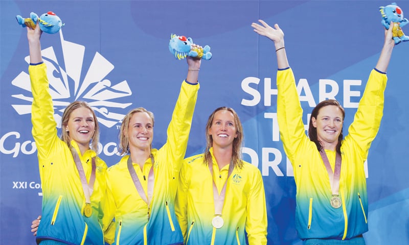 Gold medalists Shayna Jack, Bronte Campbell, Emma McKeon and Cate Campbell of Australia celebrate on the podium after winning the women&rsquo;s 4 x 100m freestyle relay final.&mdash;Reuters