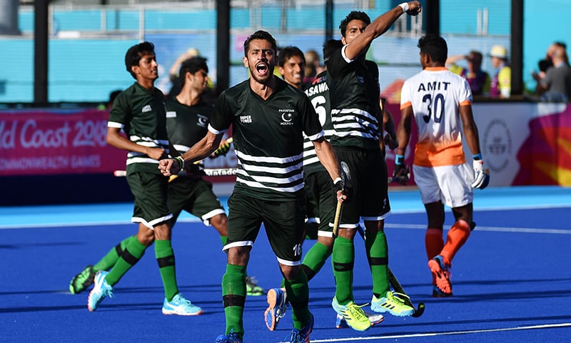 Pakistan players celebrate their 2-2 draw against India after their men's field hockey match between India and Pakistan at the 2018 Gold Coast Commonwealth Games. —AFP