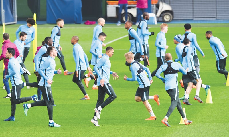 MANCHESTER: Manchester City players attend a training session at City Football Academy on Monday, ahead of their UEFA Champions League quarter-final second leg against Liverpool.&mdash;AFP
