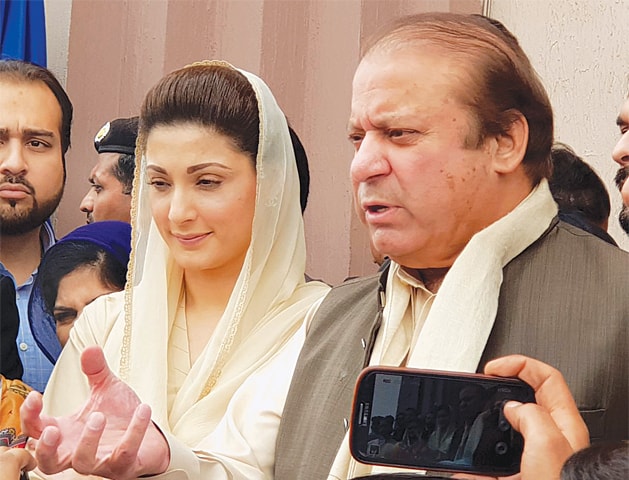 FORMER prime minister Nawaz Sharif talking to reporters outside the NAB court on Wednesday.—Tanveer Shahzad / White Star