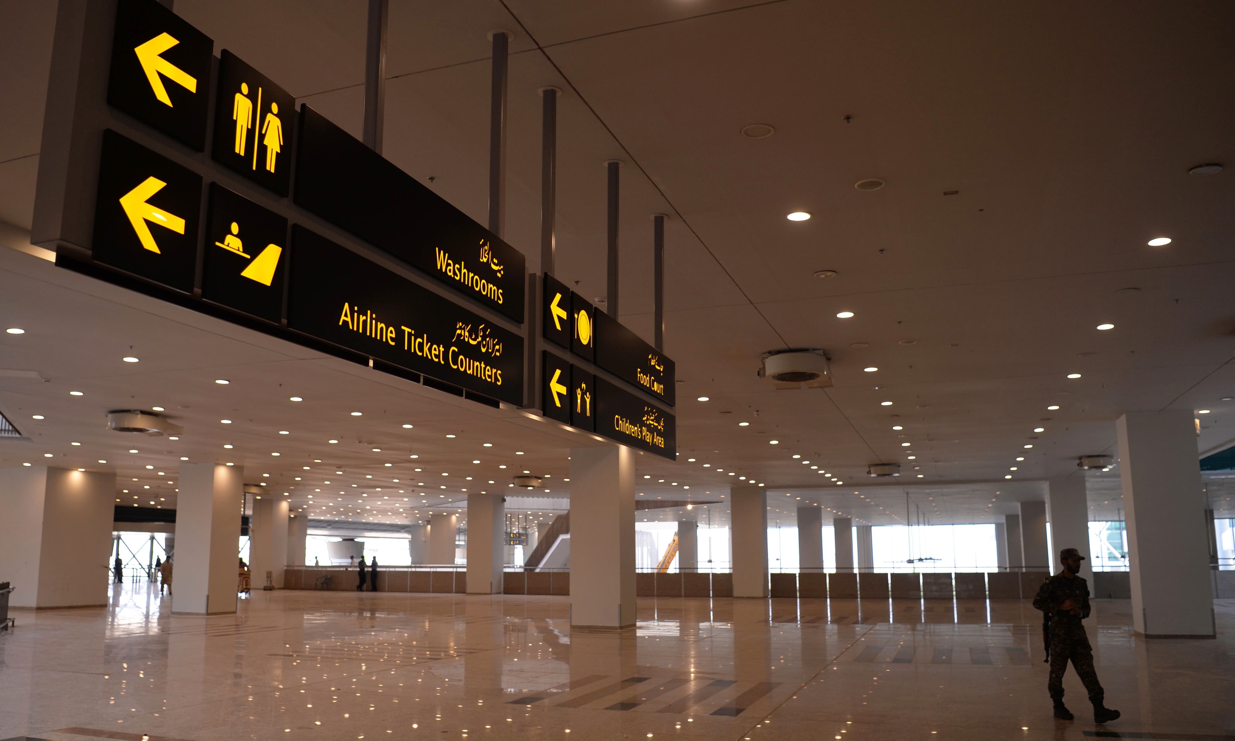 A security official from the Airport Security Force (ASF) walks through the airport.  — AFP