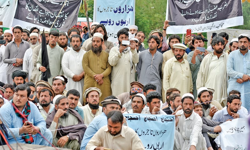 Traders from North Waziristan protest outside the National Press Club on Friday. — White Star