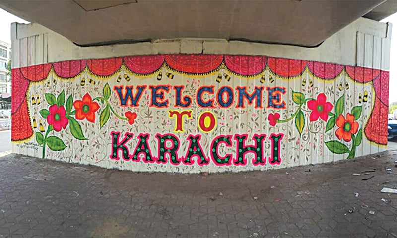 A decorated wall under the bridge at the Jinnah International Airport