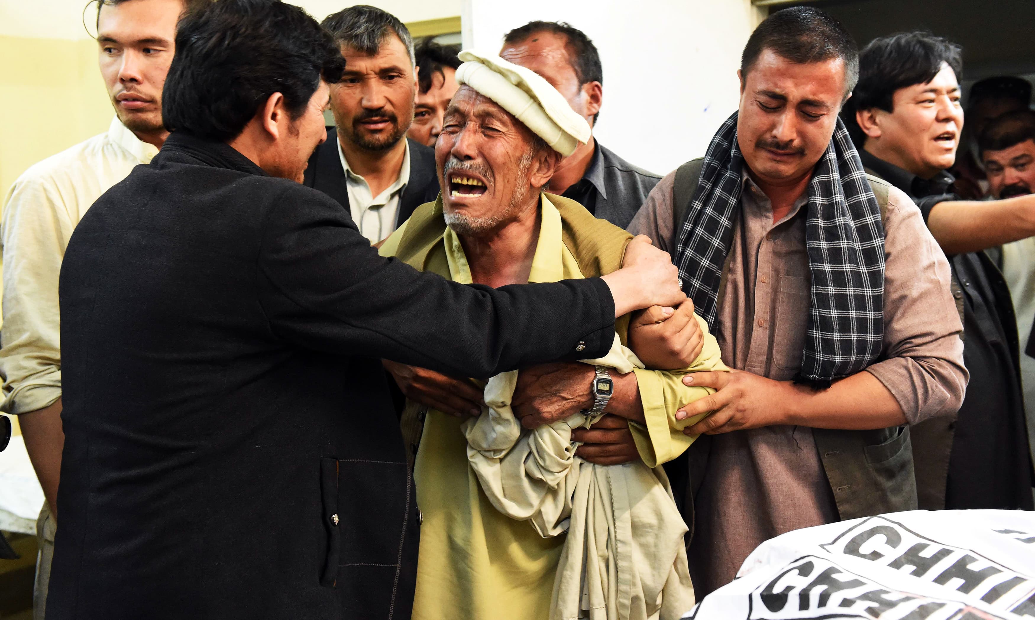 An elderly man mourns the death of his son in a deadly shooting incident in Quetta. —AFP