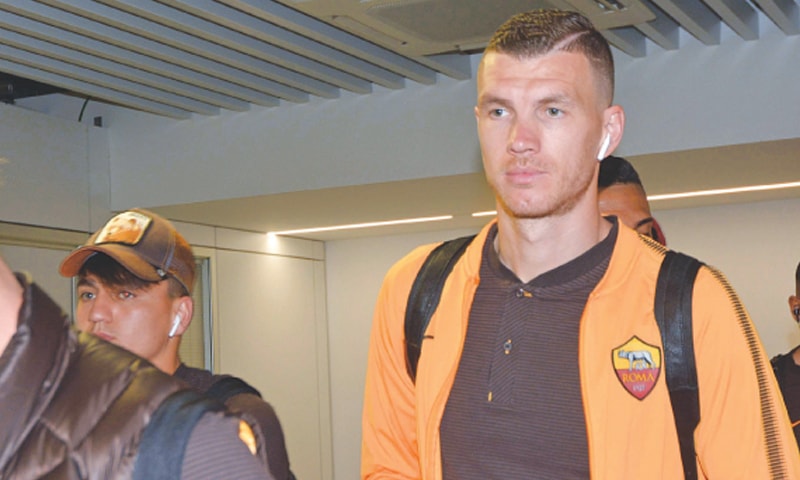 ROME: AS Roma&rsquo;s Edin Dzeko arrives at the Fiumicino Airport on Monday, ahead of the team&rsquo;s flight to Liverpool.&mdash;AP