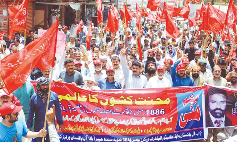 WAPDA union members hold a rally in Hyderabad on Tuesday to observe Labour Day.&mdash;Dawn