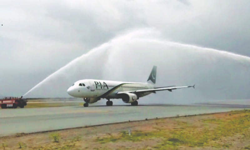 A VIDEO grab shows water being sprayed over a Pakistan International Airlines aircraft to mark the opening of the new Islamabad airport on Tuesday.&mdash;Dawn