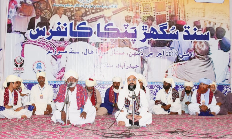 A FOLK poet recites mystic verses at the programme at Sindh Museum in Hyderabad on Sunday.—Dawn A FOLK poet recites mystic verses at the programme at Sindh Museum in Hyderabad on Sunday.—Dawn