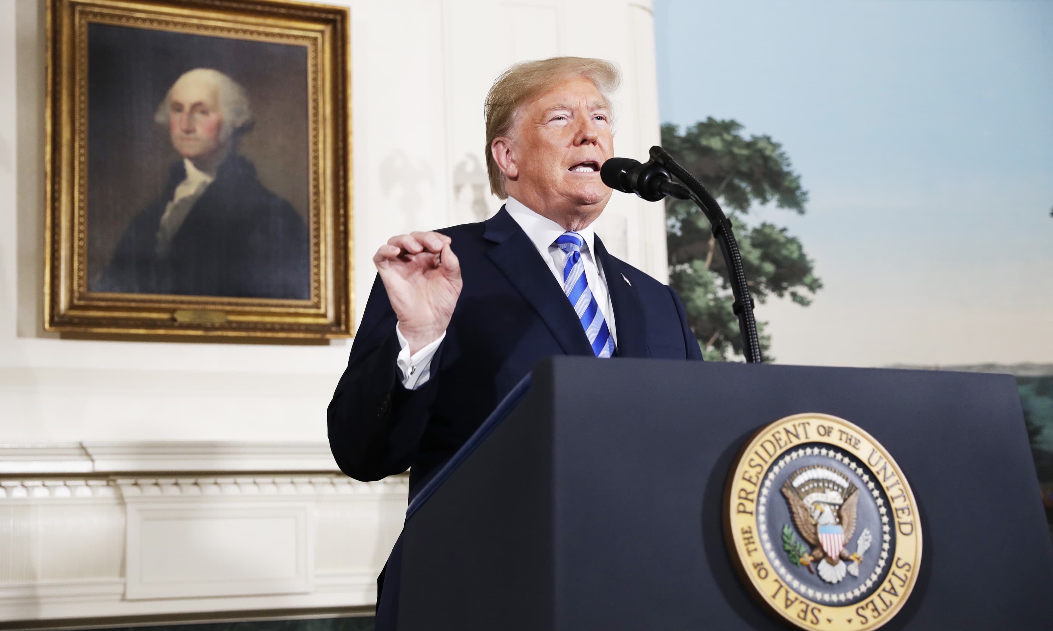 Donald Trump delivers a statement on the Iran nuclear deal from the Diplomatic Reception Room of the White House. —AP