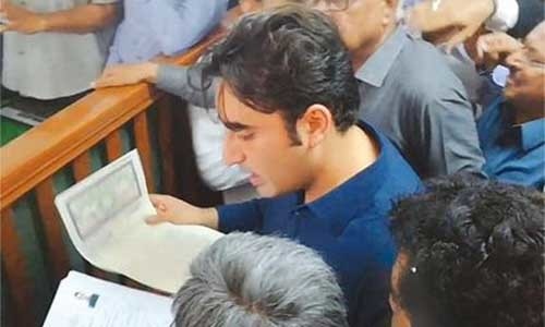 Pakistan Peoples Party Chairman Bilawal Bhutto-Zardari submits his [nomination papers][1] to presiding officer at City Court in Karachi on Thursday.—PPI