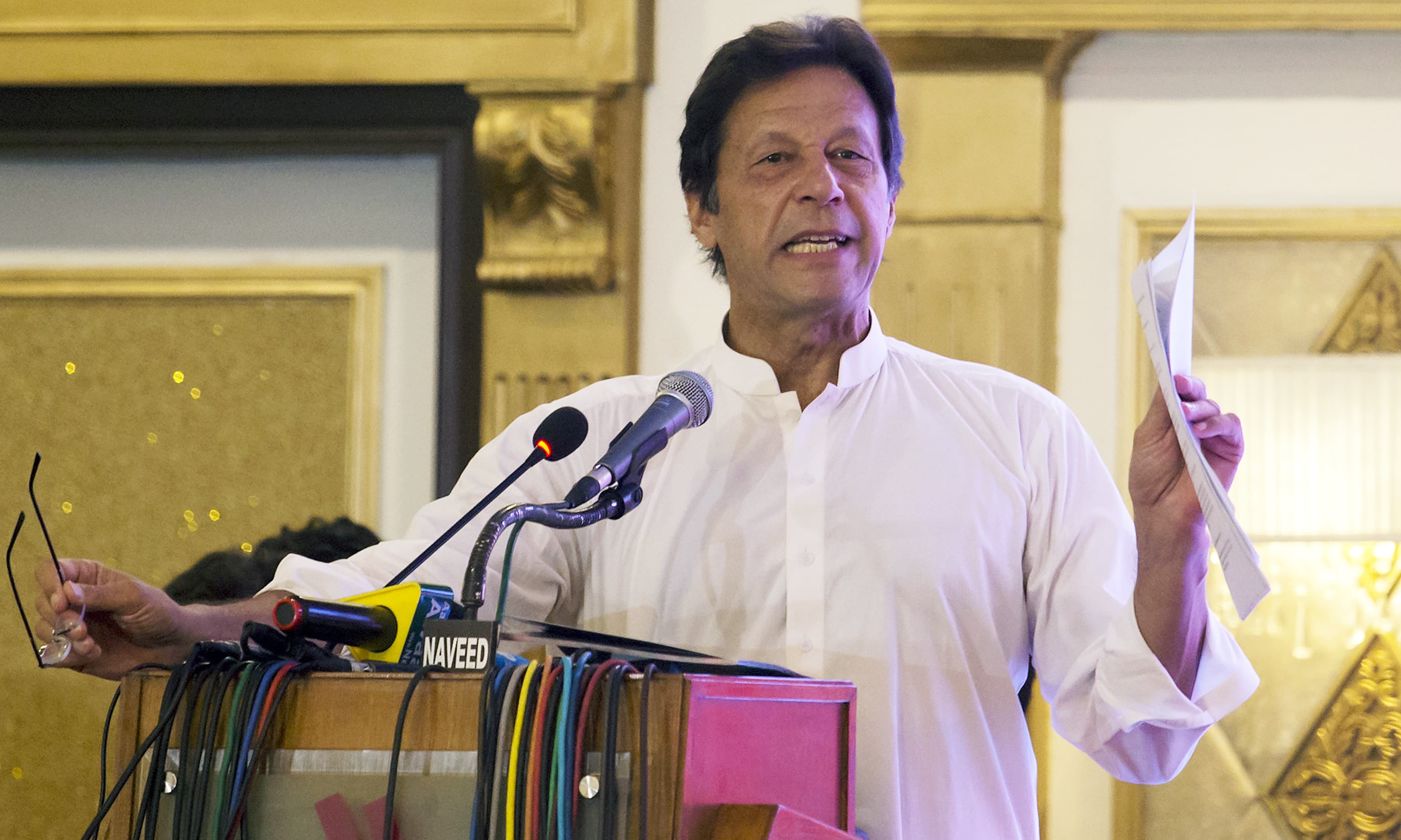 Imran Khan speaks during a press conference to present the party's manifesto for the forthcoming election. —AP