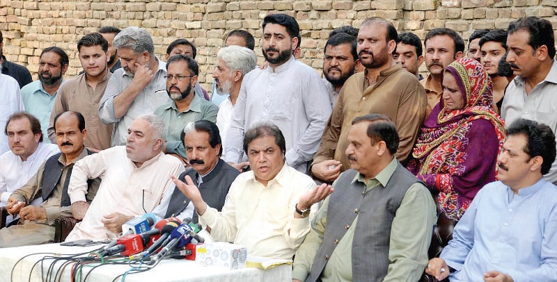PML-N leader Hanif Abbasi speaks at the press conference on Wednesday. Chaudhry Tanveer, Sardar Naseem, Malik Abrar and Raja Hanif are also present. &mdash; Online
